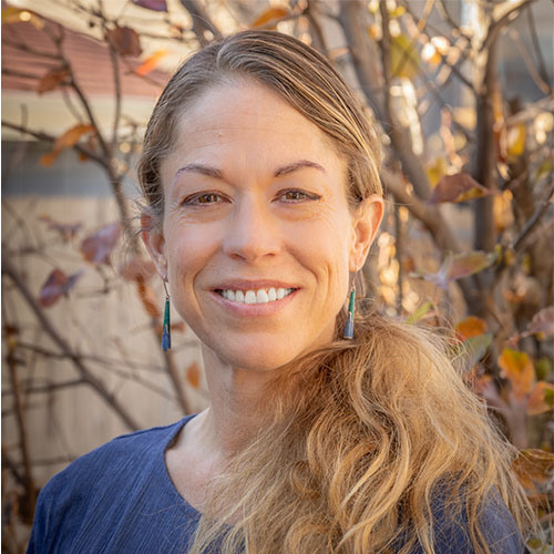 Portrait of Natalie WagnerWillis, Certified Money Coach and Finologist.